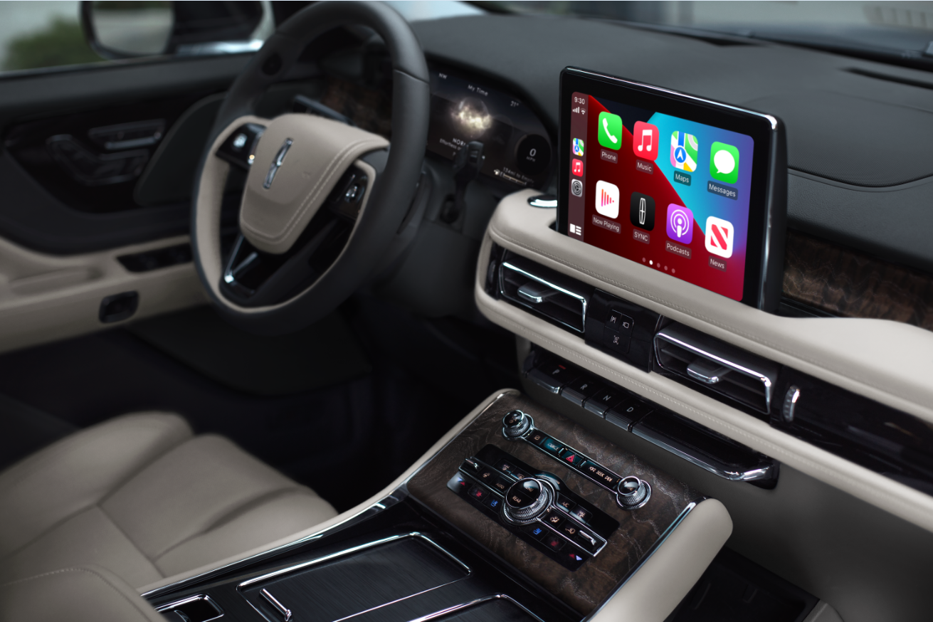 The interior of a Lincoln Aviator® SUV is shown with emphasis on the center touchscreen | Rydell Lincoln in Independence IA