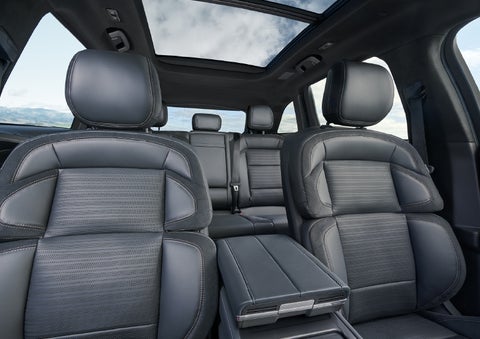The spacious second row and available panoramic Vista Roof® is shown. | Rydell Lincoln in Independence IA